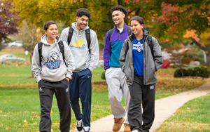 Students walking through camps