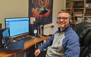 admissions counselor at a computer