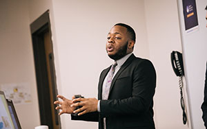 student giving a presentation in a class