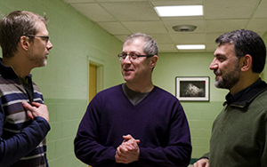 Niles Goldstein (center), an ordained Reform Jewish rabbi, is one of two teachers bringing a Jewish perspective to EMU this semester. Goldstein is pictured here with two other colleagues: Reuben Shank (left), a Mennonite who is studying for a doctorate in religion at the University of Virginia, and Amir Akrami, a Muslim scholar from Iran.