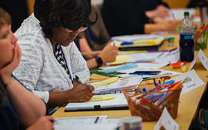 Student taking notes