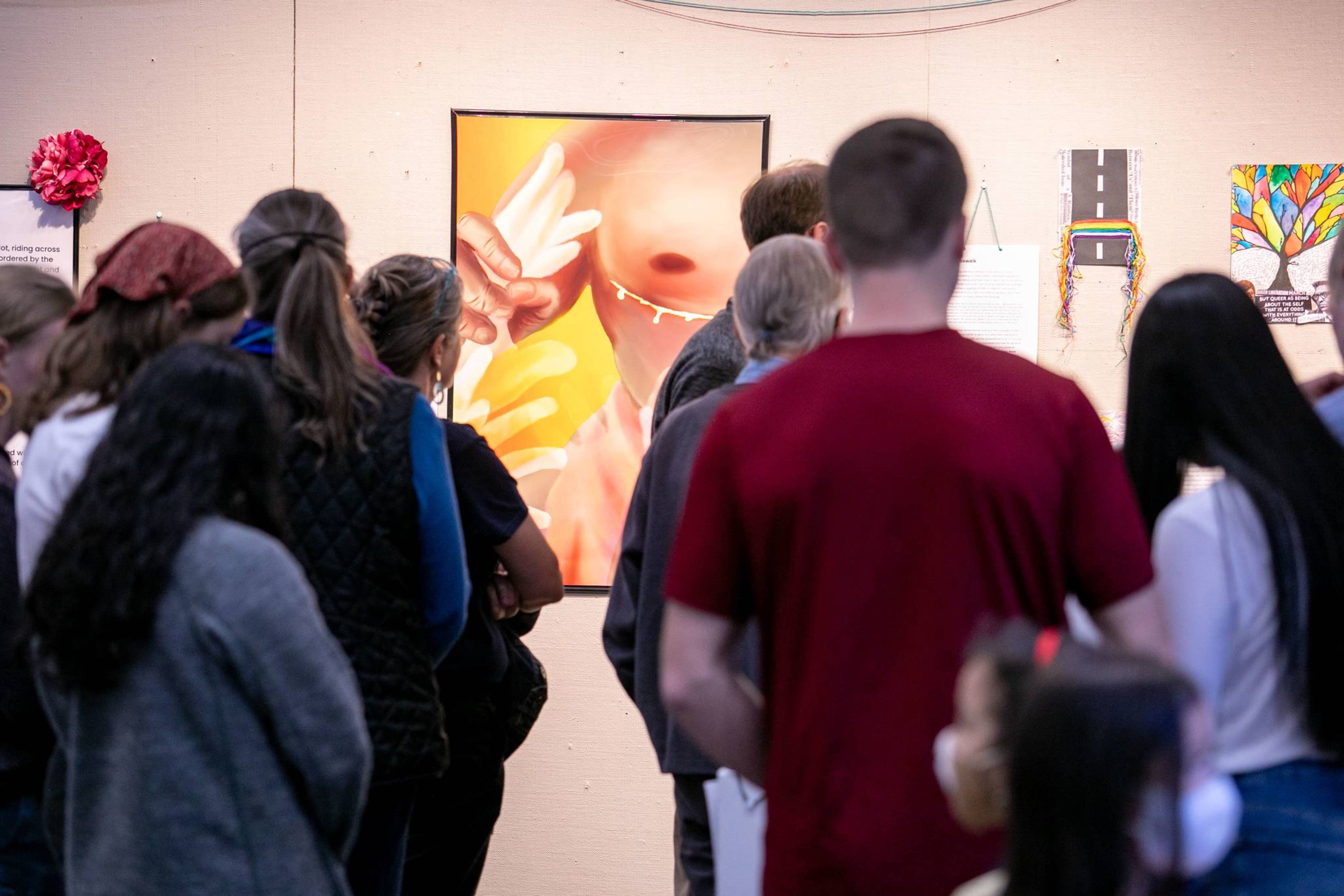 People touring the art exhbit