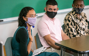 Alumni speaking to students