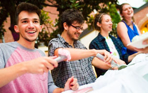 students scooping ice cream