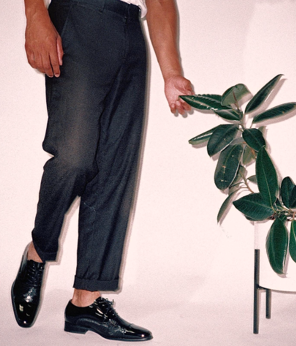 a person holding a branch