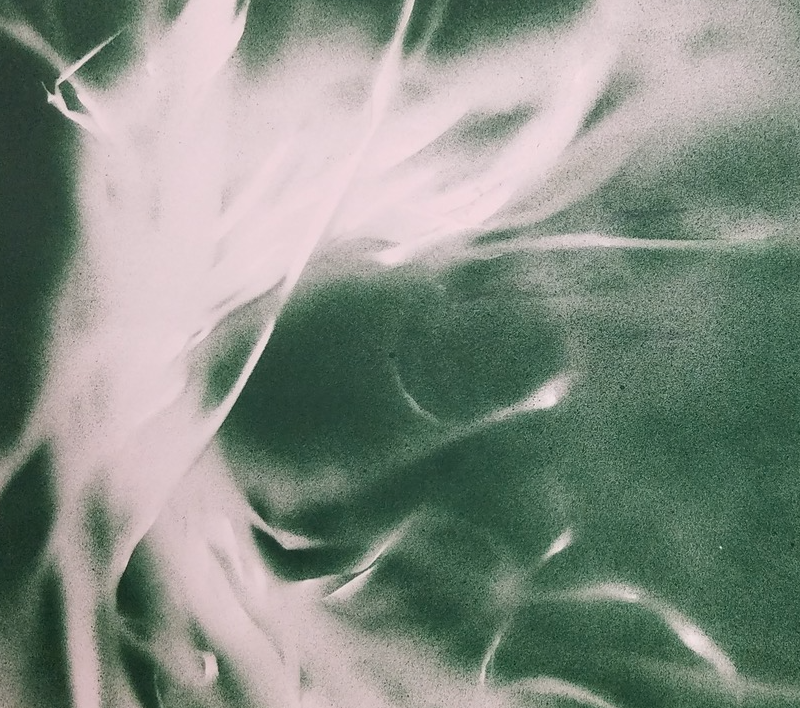 swirling green and white