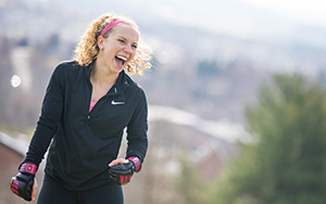student laughing outside