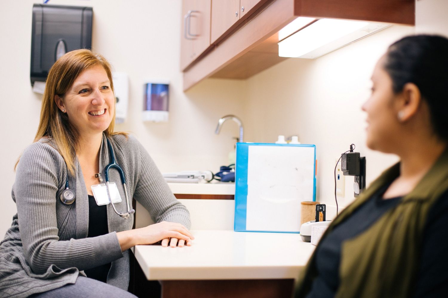 Nurse consulting a patient