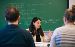 teacher in a small group with student