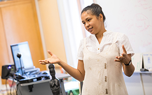 Teacher in front of classroom