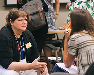 professor talking one on one with a student