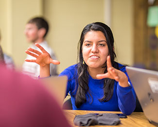 Woman talking in class