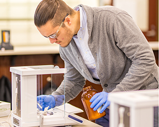 student doing chemistry experiment