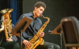 Student playing saxophone
