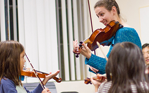 Violin instructor and student