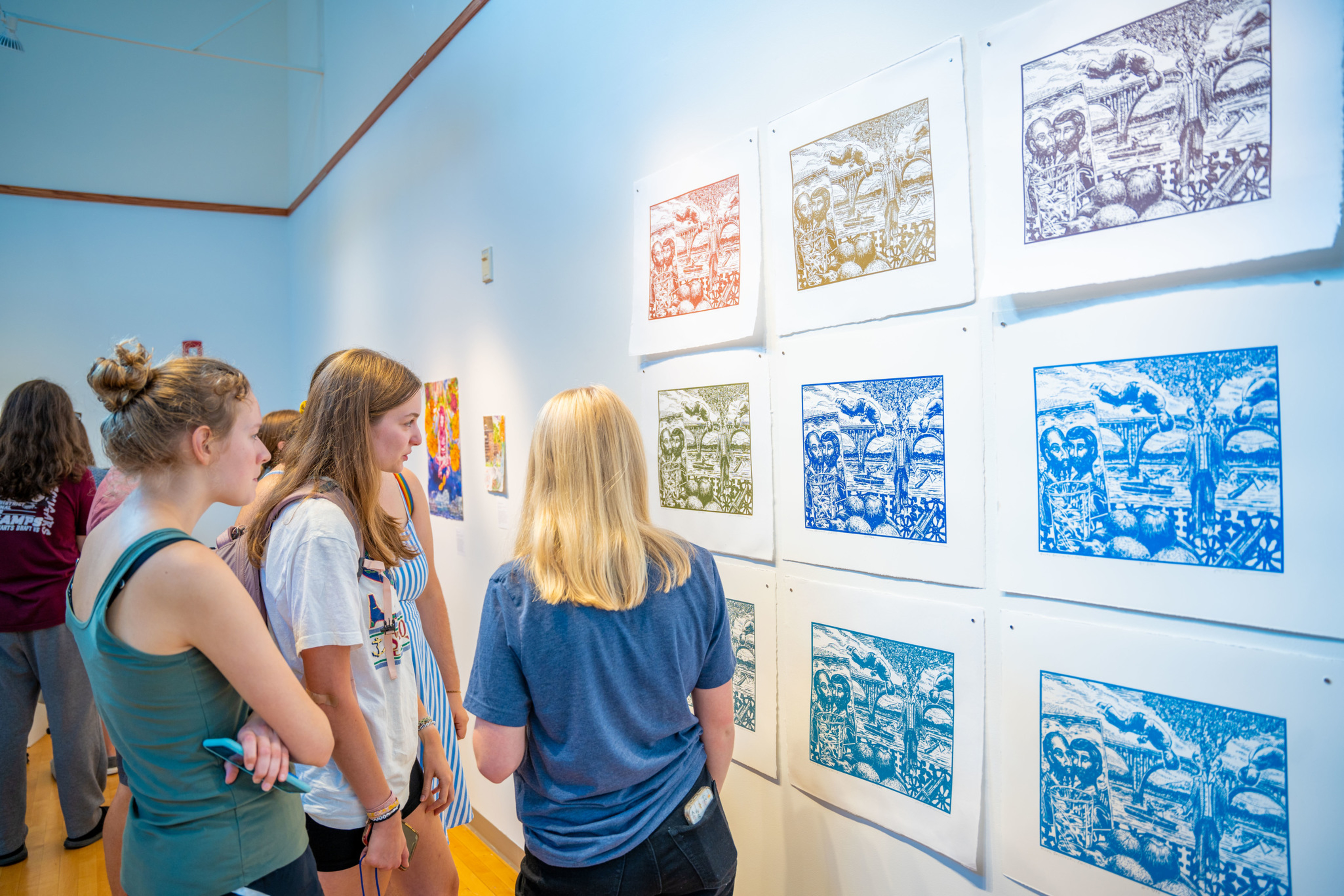 gallery art with students walking around